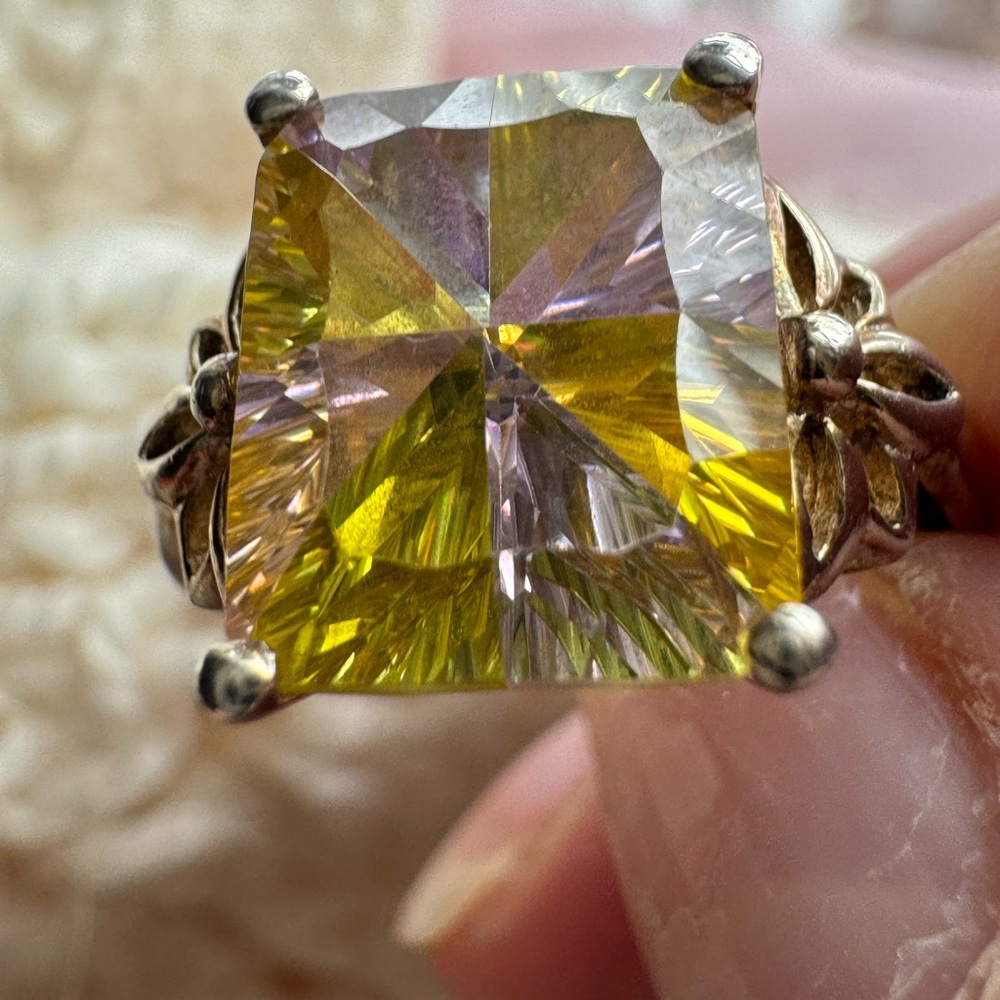 Ametrine ring in sterling silver yellow with wonderful flashes of purple.